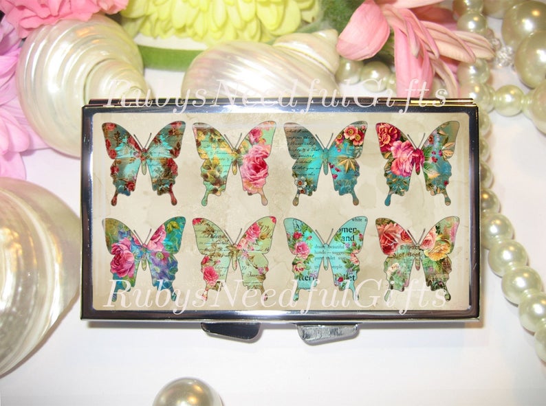 butterfly decorated pill organiser