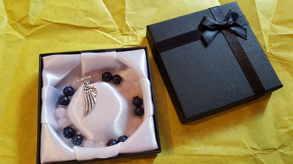 lapis lazuli and rose quartz bracelet in box.