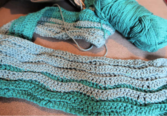 wip of my blanket in blue and green waves.