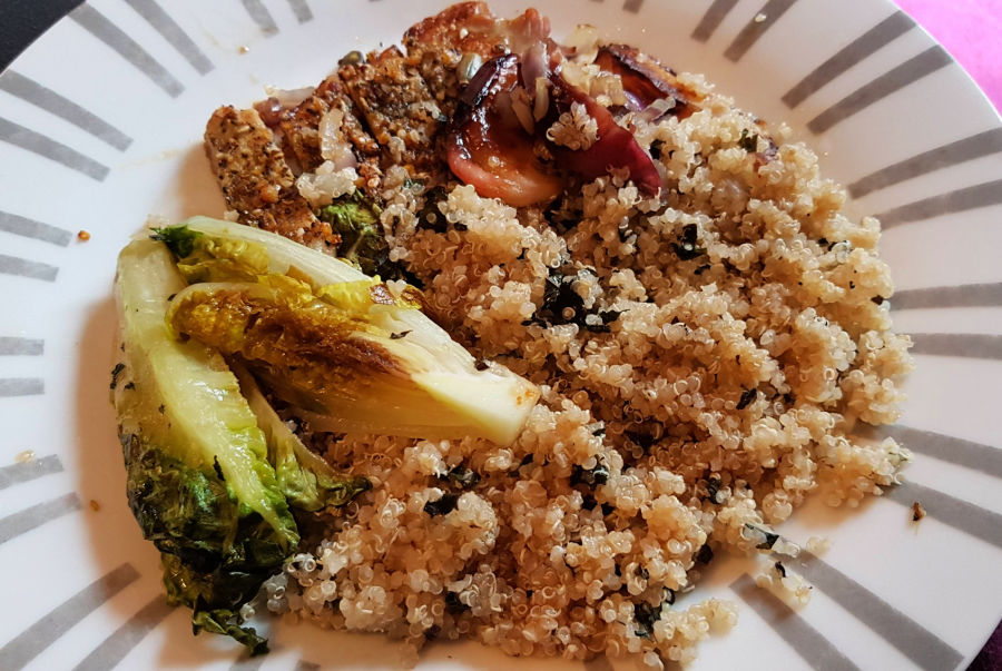 mindful eating, image shows a play with pork, bulgar wheat and charred lettuce.
