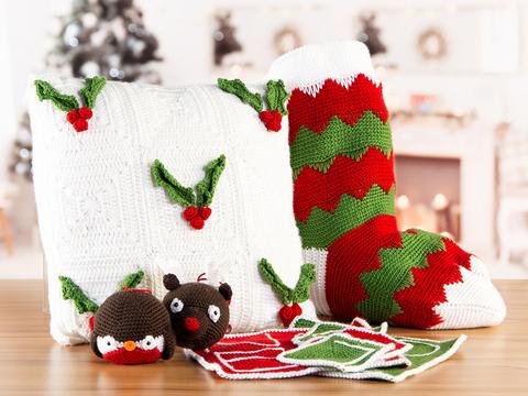 Christmas crochet along pack with cushion tree decorations, placemats and a big Christmas stocking