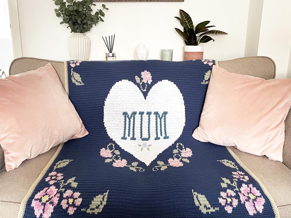 blue and pink blanket with flowers and heart and the word Mum