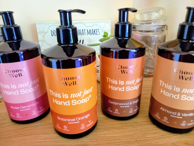 Four bottles of choose well hand soap, rose geranium, botanical orang, cedarwood and sage and Almond and Vanilla.