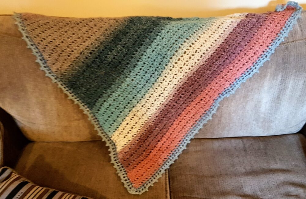 graduated shawl in soft coloured wool